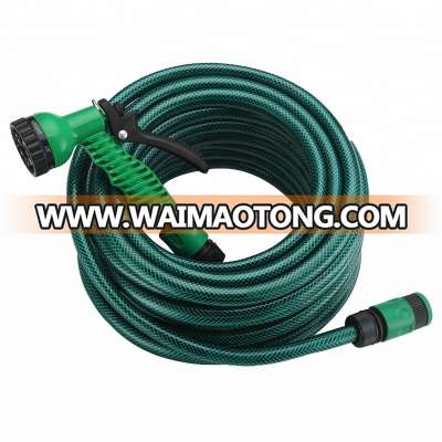 Green flexible PVC garden hose with spray gun/connecor